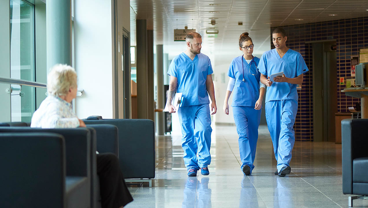 Doctors walking in hospital