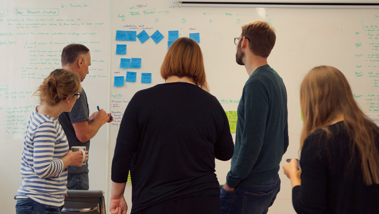 Anna in a workshop with colleagues