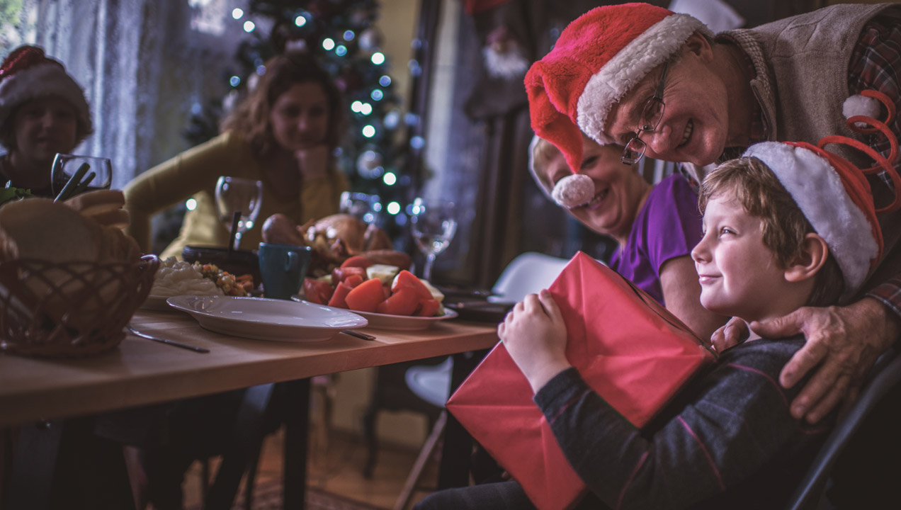 Opening presents at the dinner table