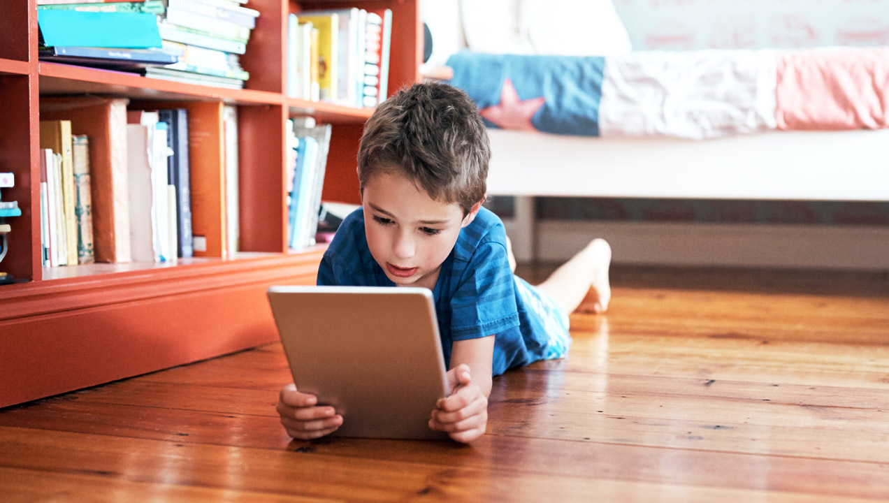 Young boy using iPad